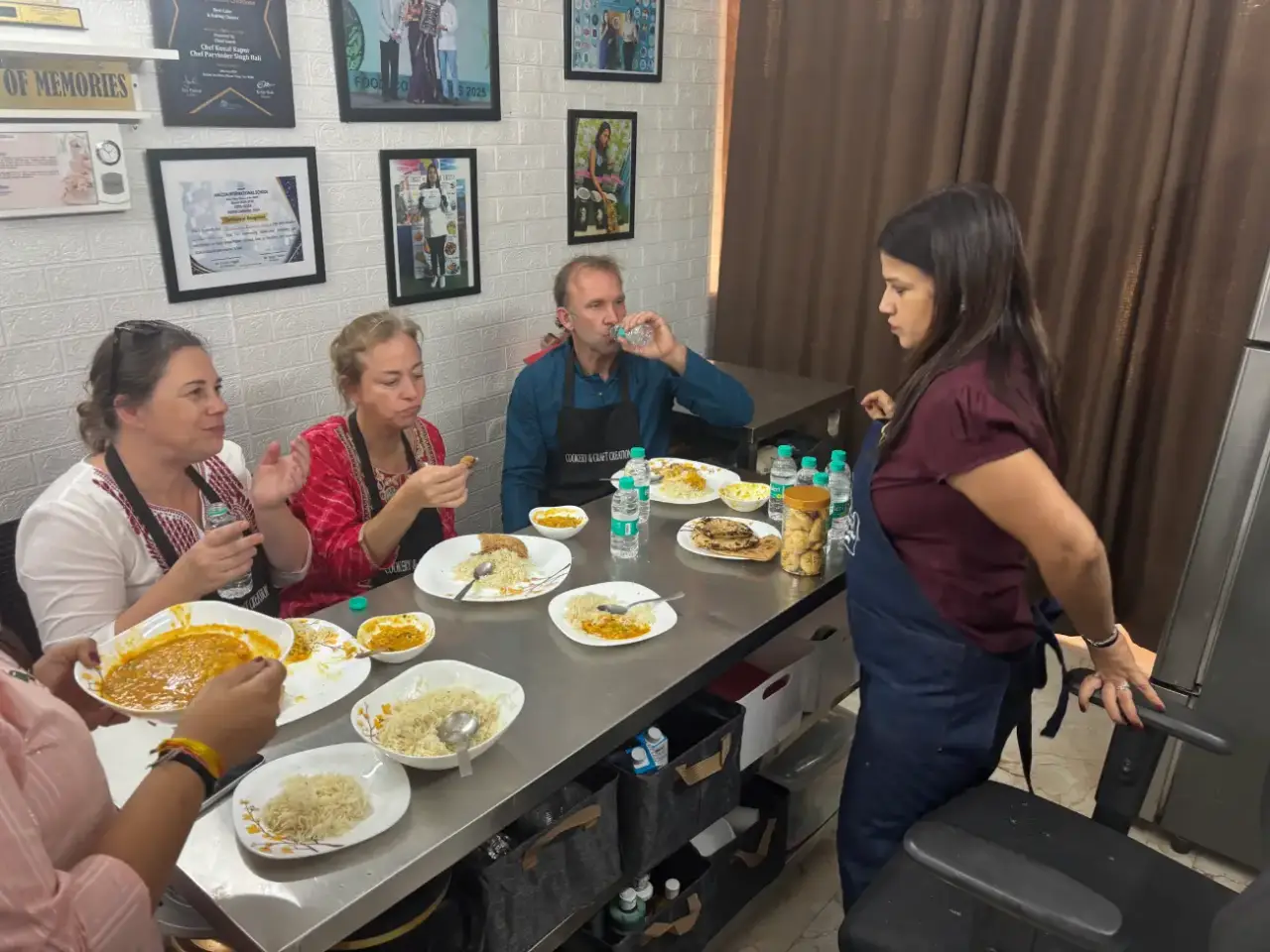 Welcome to Agra Trip Packages - A Government-Certified Travel Agency in Agra 38 Authentic-Agra-Home-Kitchen-Experience-–-Travelers-Tasting-Their-First-Indian-Home-Cooked-Meal (1)