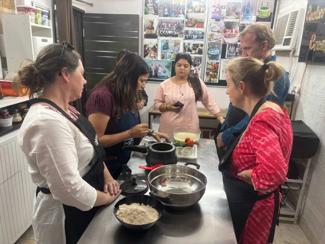 Welcome to Agra Trip Packages - A Government-Certified Travel Agency in Agra 37 Authentic-Indian-Home-Kitchen-Experience-in-Agra-–-Travelers-Learning-Local-Cooking-1