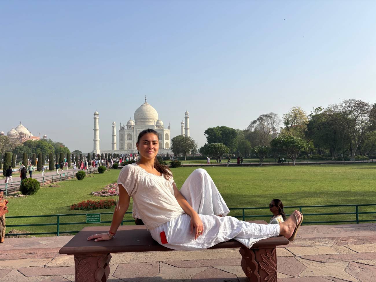 Safety and Comfort 2 tourist capturing the moment in the taj mahal